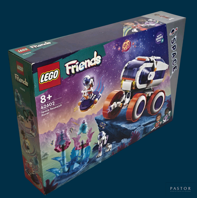 une boîte contenant un ensemble Lego Friends avec un véhicule spatial