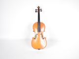 an orange violin sitting on top of a white surface next to a white wall