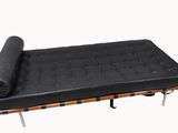 black leather futon bed with wooden frame and black mattress
