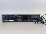 a close up of a power supply unit with wires and plugs