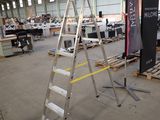 a ladder in the middle of a large room