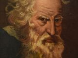portrait d'un vieil homme barbu portant une chemise bleue