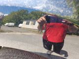 a man taking a picture of himself in the rear view mirror of a car