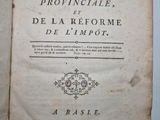 an open book with a black and white image of a man ' s hand holding a book