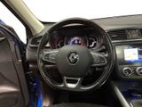 a picture of the interior of a car with a steering wheel