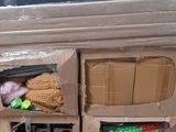a cardboard box that has a bunch of items inside of it