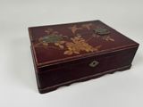 an image of a small wooden box with flowers on it