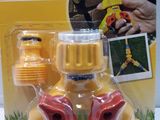 yellow plastic sprinkler with red and yellow sprinkler attached to it