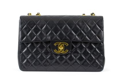 a chanel black quilted lambskin shoulder bag with gold hardware