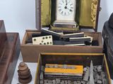 a box with a clock inside of it on a table