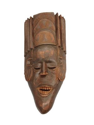 an image of a wooden mask on a white background
