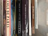 many books in a plastic box on the shelf