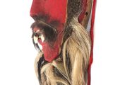 a red mask with a beard and mustache on a white wall