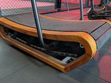 a tread machine in the middle of a gym