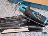 a small electric tool that is sitting on the floor