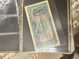 a picture of an old bank note in a case