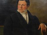 painting of a man in a black suit and white shirt sitting in a chair
