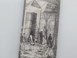 a tag with a picture of people in a building