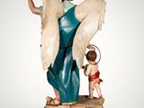 an image of a statue of an angel and a child on a pedestal