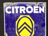 un panneau bleu et jaune sur lequel est inscrit « Citroën »