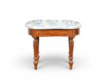 a small wooden stool with a blue and white pattern on it