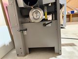 a machine that is sitting on the floor in the room