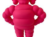une image représentant une figurine gonflable rose posée sur une surface blanche