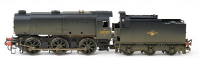 a toy train that is sitting on a white surface