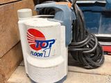 a picture of a bucket of water on a wooden shelf