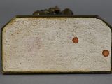 a picture of a close up of a white and brown box