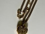 gold plated necklace with a heart shaped pendant on a ball chain