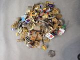 a pile of junk on the ground next to a pair of scissors