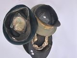 two hats sitting on top of each other on a table