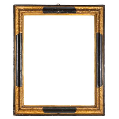 un cadre photo doré et noir sur fond blanc