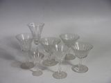a group of wine glasses sitting on a table