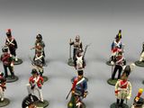 a lot of figurines of soldiers that are posed together