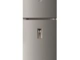 a silver refrigerator with a water dispenser on top of it