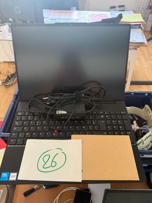 a laptop computer sitting on top of a desk