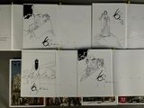 six drawings of a man and woman on the wall
