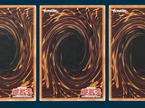 three cards with a picture of a spiral design on them