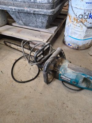 an image of a hammer and a bucket of dirt
