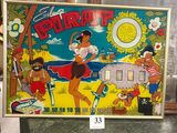 a pinball game on display in a store
