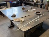 a table that has some tools on it in a room