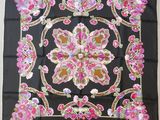 black silk scarf with pink and gold floral design