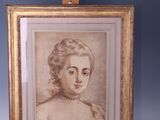 portrait of a woman in profile by an easel