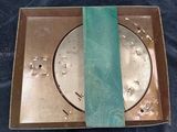 a box that has a green tie in it