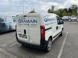 a white van that is parked in a parking lot