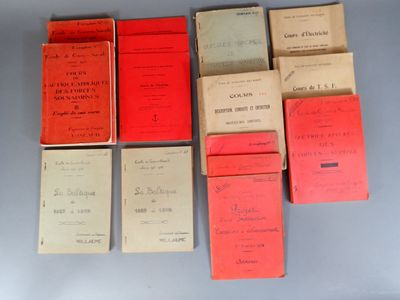 several books are lined up on a table with red covers