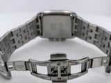 an image of a wrist watch on a white surface with a white background