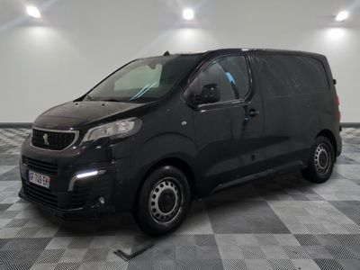a picture of a black van on a checkered floor